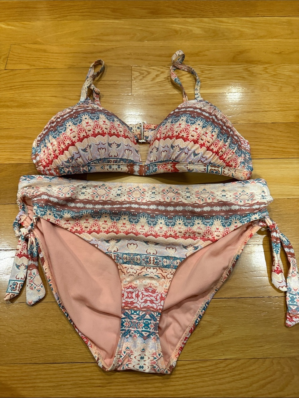 Time and tru bikini set top is large and bottom are a medium.